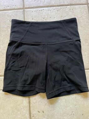 Athleta biker shorts salutation